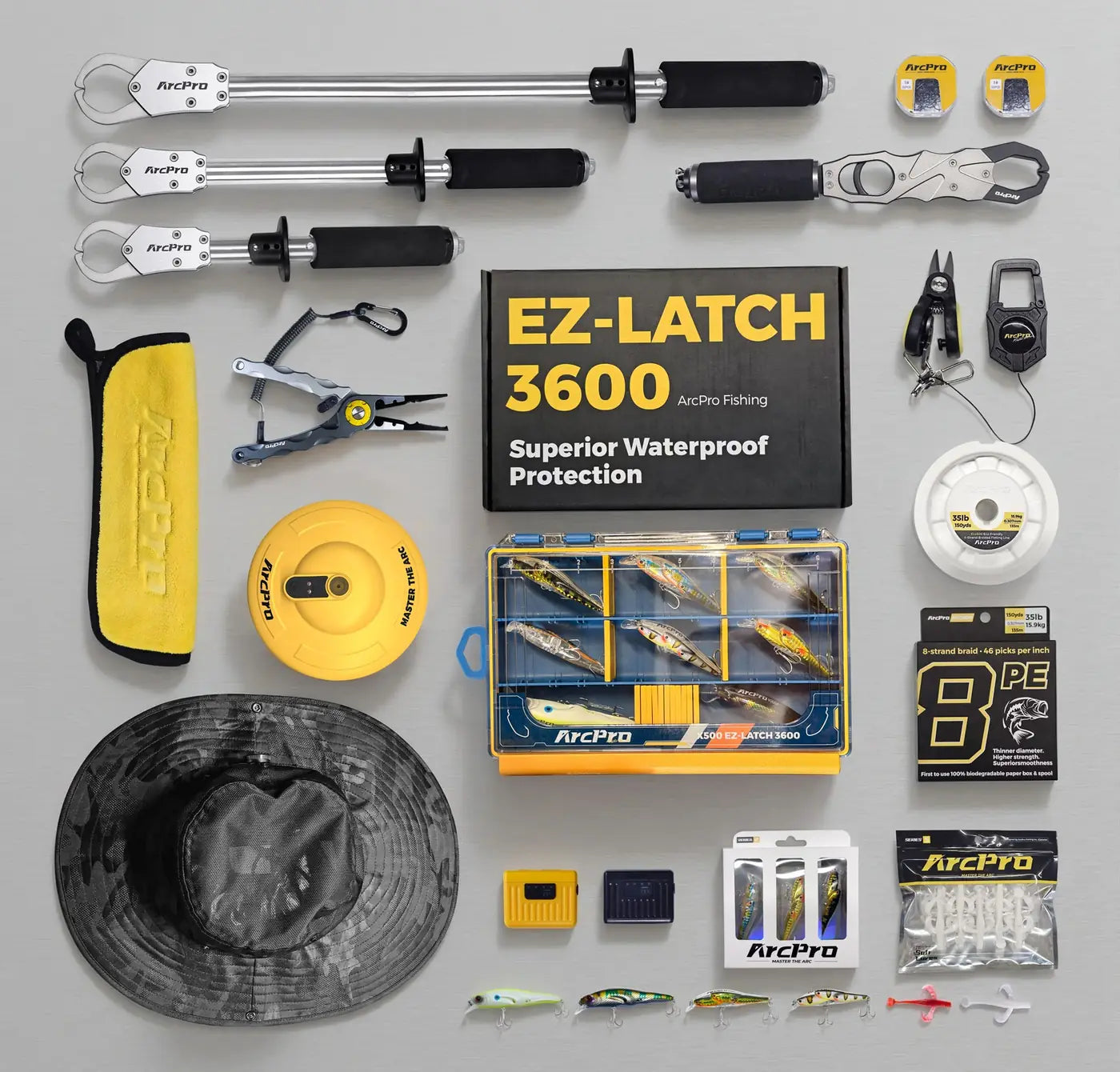 The ArcPro range laid out flat: grippers, pliers, aerator, tackle boxes, hats, line and lures